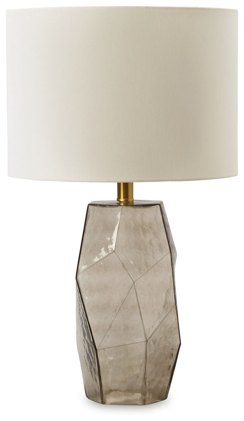 Gray glass table lamp with white drum shade, faceted base, and gold stem