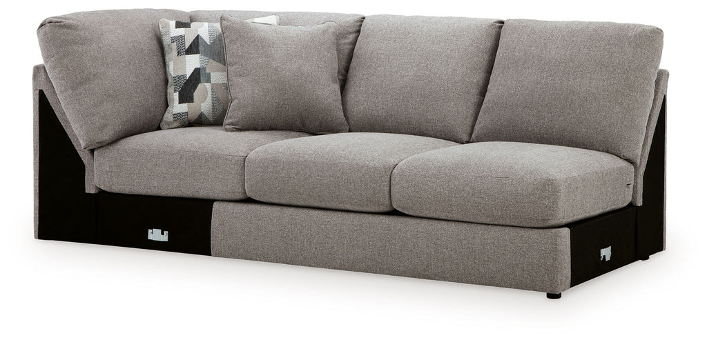 Smoke gray armless loveseat with wedge, tufted cushions, black base, square profile