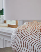 Table lamp base and white drum shade with distressed textured surface and terracotta lines