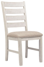 Light wood dining side chair with beige upholstered seat and slatted back
