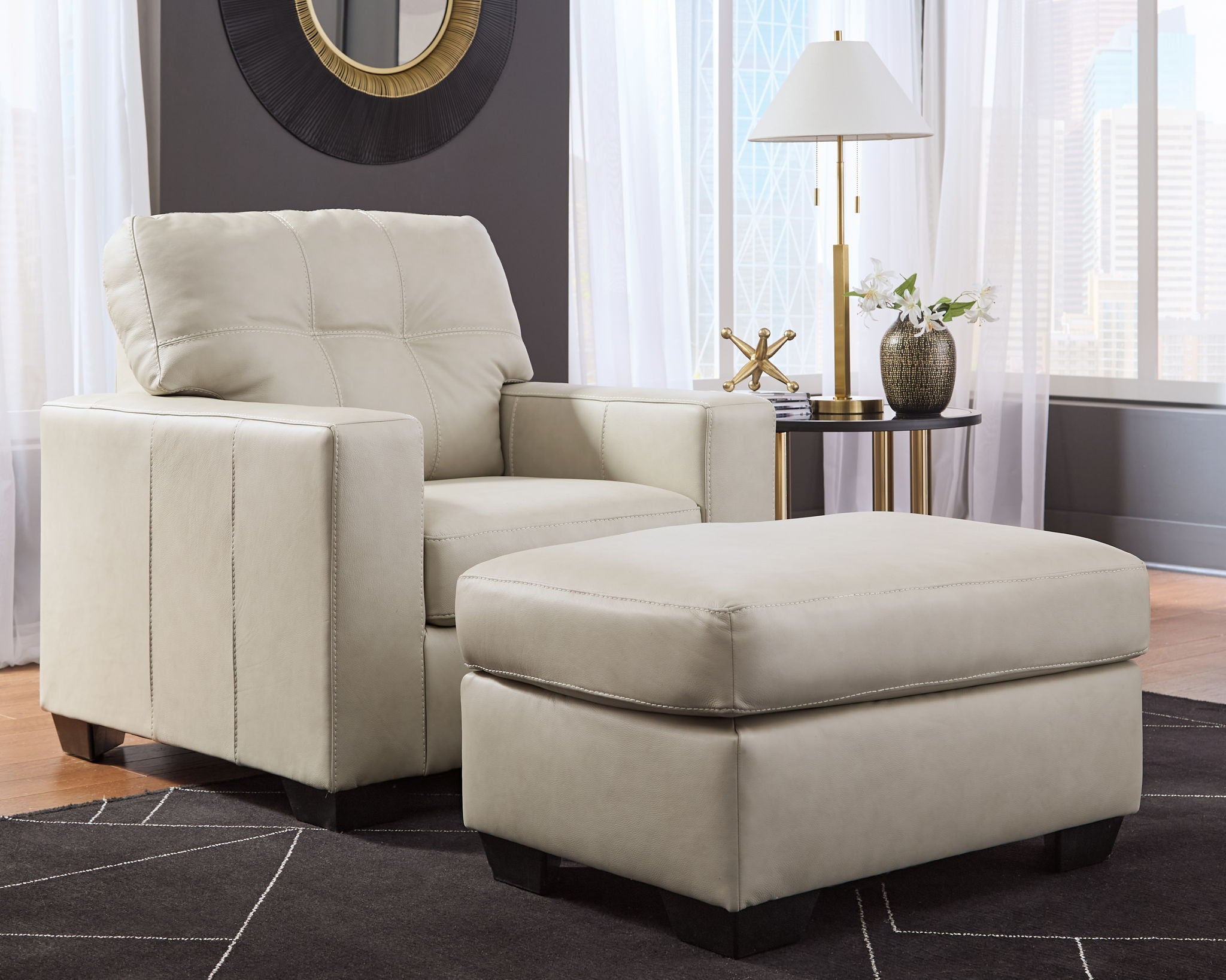 Beige upholstered armchair with matching ottoman, reclined style front view