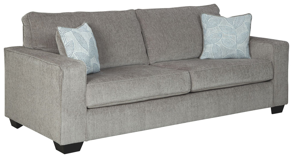 Alloy sleeper sofa in a side angle with two square patterned throw pillows
