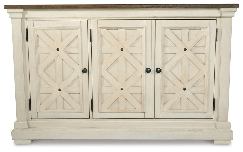 Beige dining room server cabinet with three paneled doors and crossed wood accents