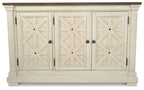 Beige dining room server cabinet with three paneled doors and crossed wood accents