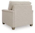 Upholstered accent chair with light beige fabric and squared side panels