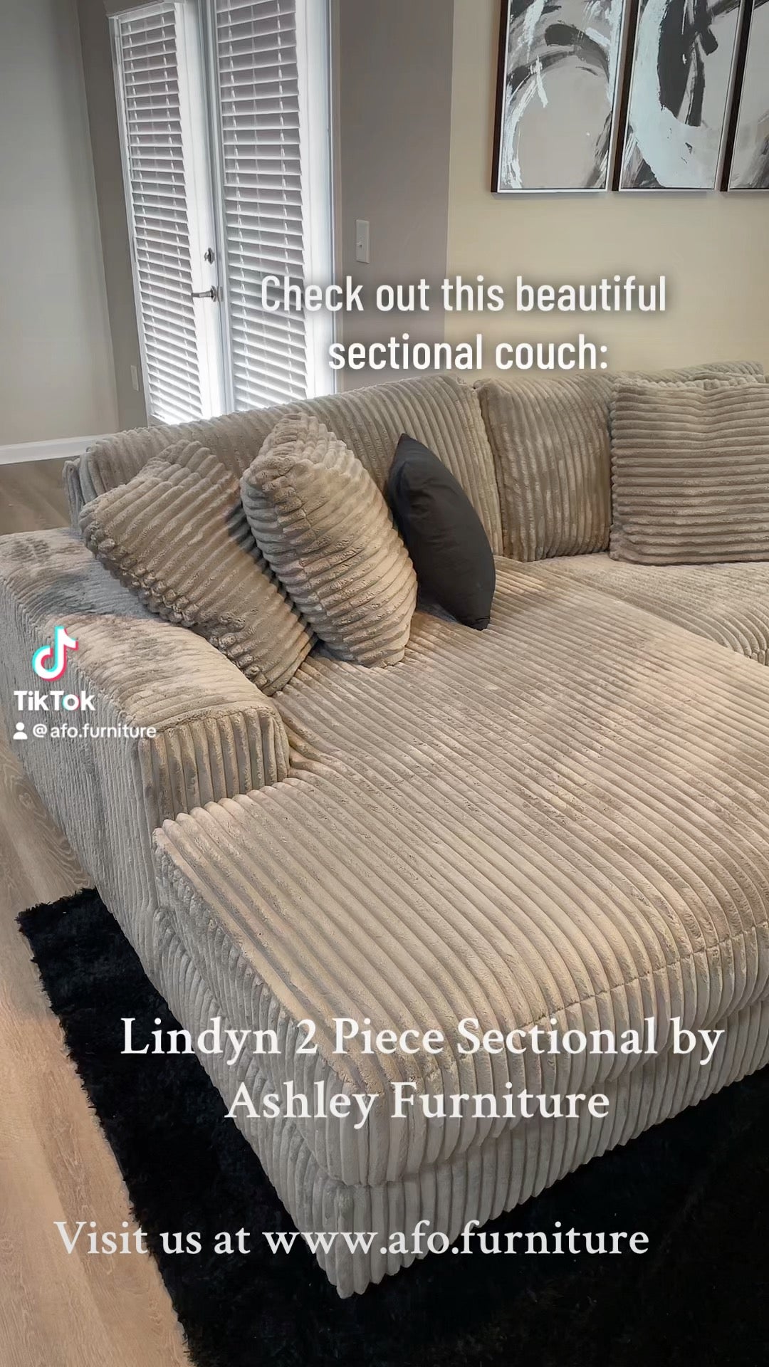 Lindyn 2-piece sectional sofa in ivory corduroy with multiple throw pillows