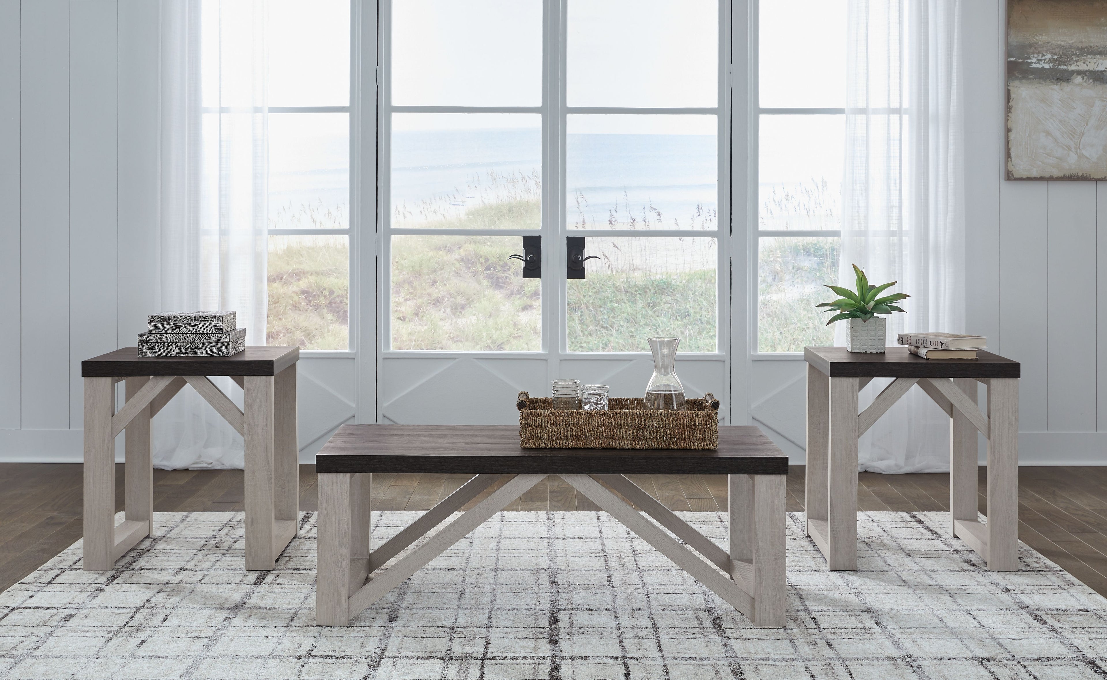 Occasional table set with dark brown tops and antique white frames, three tables