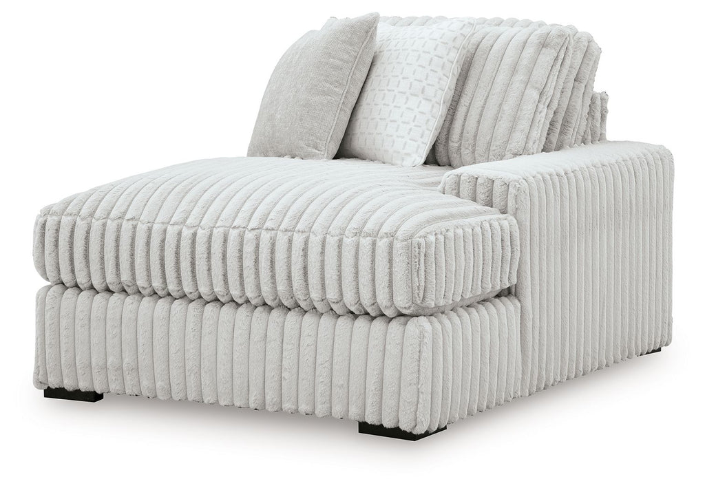 Light gray right-arm chaise lounge with ribbed arms and back cushions