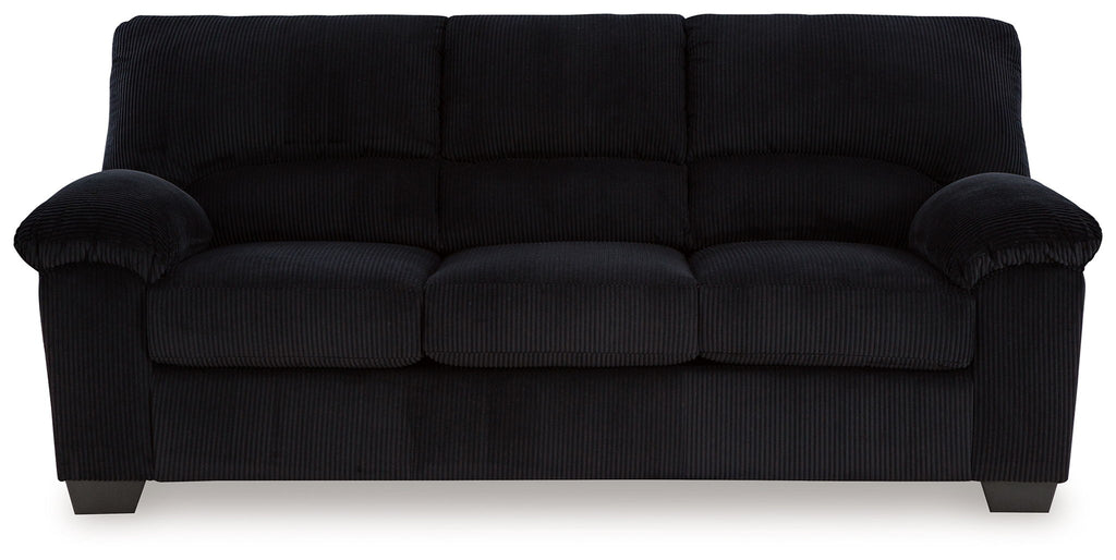 Black upholstered sofa with padded armrests, tufted back cushions, and square legs.