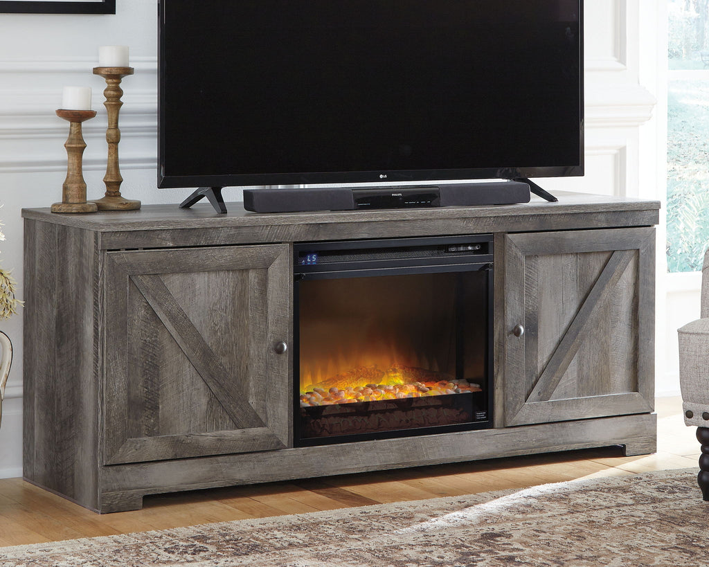 Gray TV stand with center glass fireplace insert and two side cabinet doors