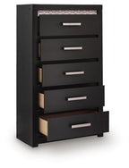 Black five-drawer chest shown at angle, with silver bar handles