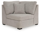 Flint gray fabric sectional wedge chair with padded arms and back cushion