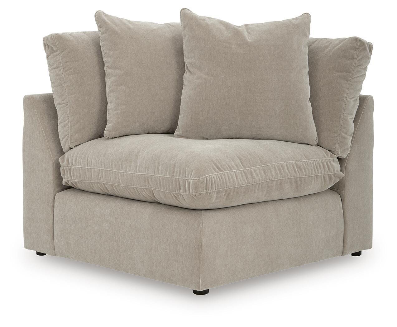 Upholstered wedge armchair in pebble beige with five seat and back cushions