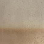 Speckled beige ceramic lamp base texture close-up