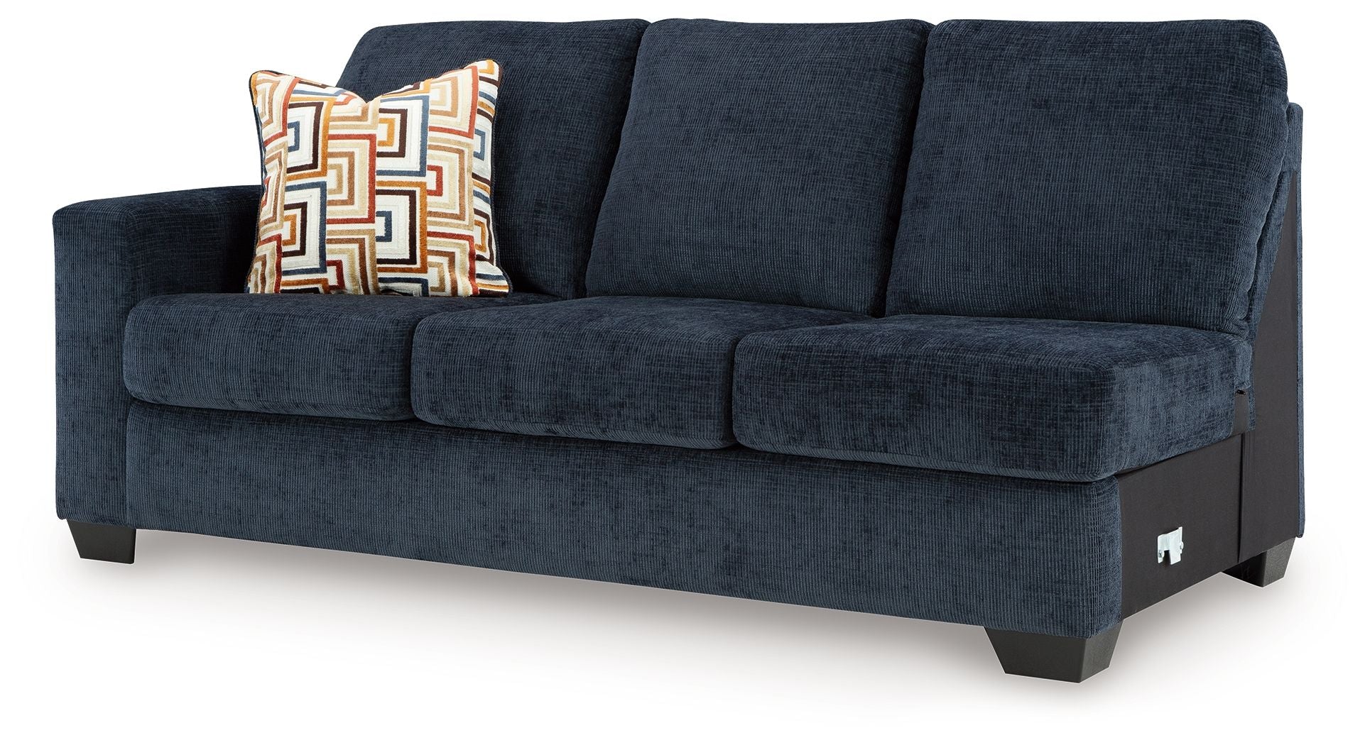 Ink blue fabric sofa side profile with square arms, three seat cushions, and throw pillow