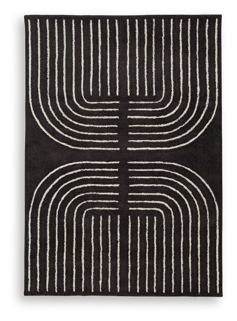 Eldonmore rug with black base and white concentric semicircle line design.