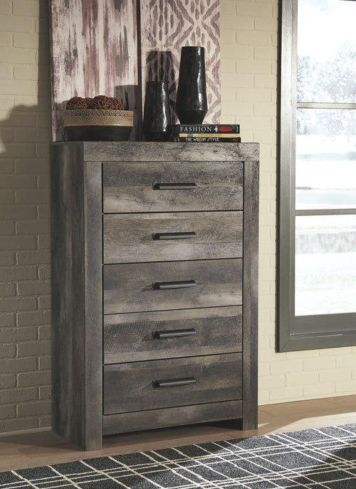 Gray five-drawer chest with dark metal bar pulls and distressed finish.