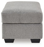 Gray fabric ottoman with thick cushioned lid and black block feet