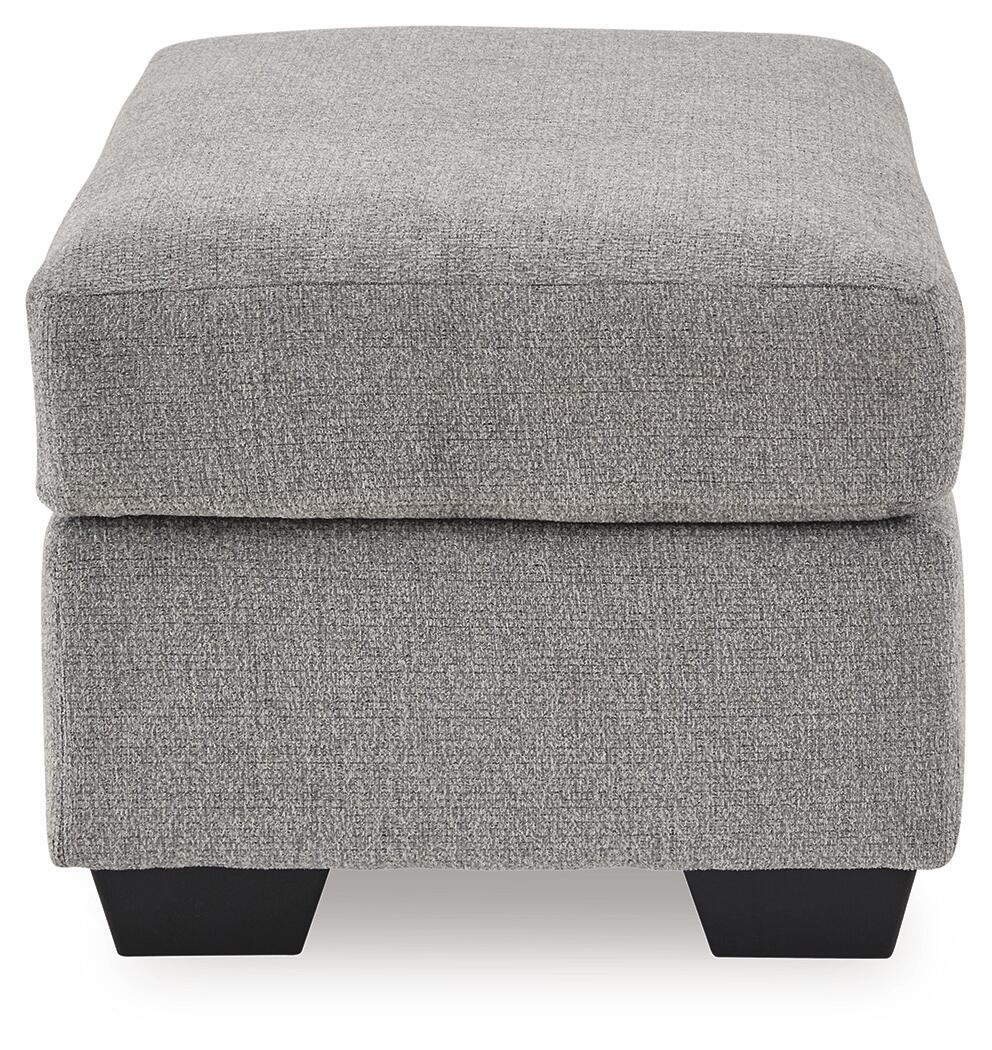 Gray fabric ottoman with thick cushioned lid and black block feet
