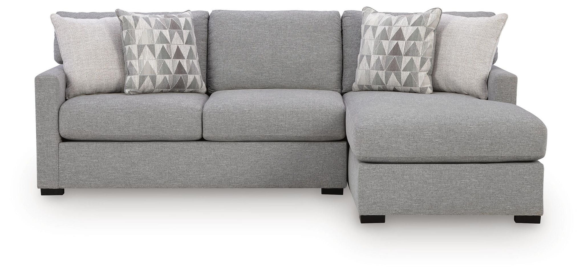 Dark gray sleeper sectional sofa with chaise ottoman and geometric throw pillows