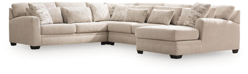 Light beige sectional sofa with chaise corner and square seat cushions