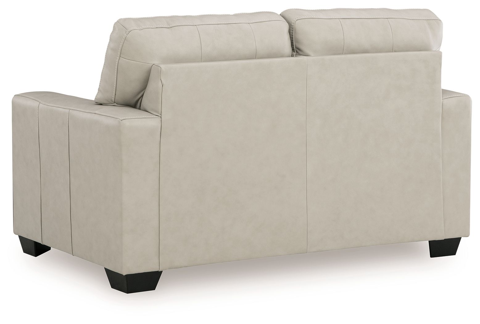 Light beige leather-look loveseat with tufted back and smooth seat, visible arm panel