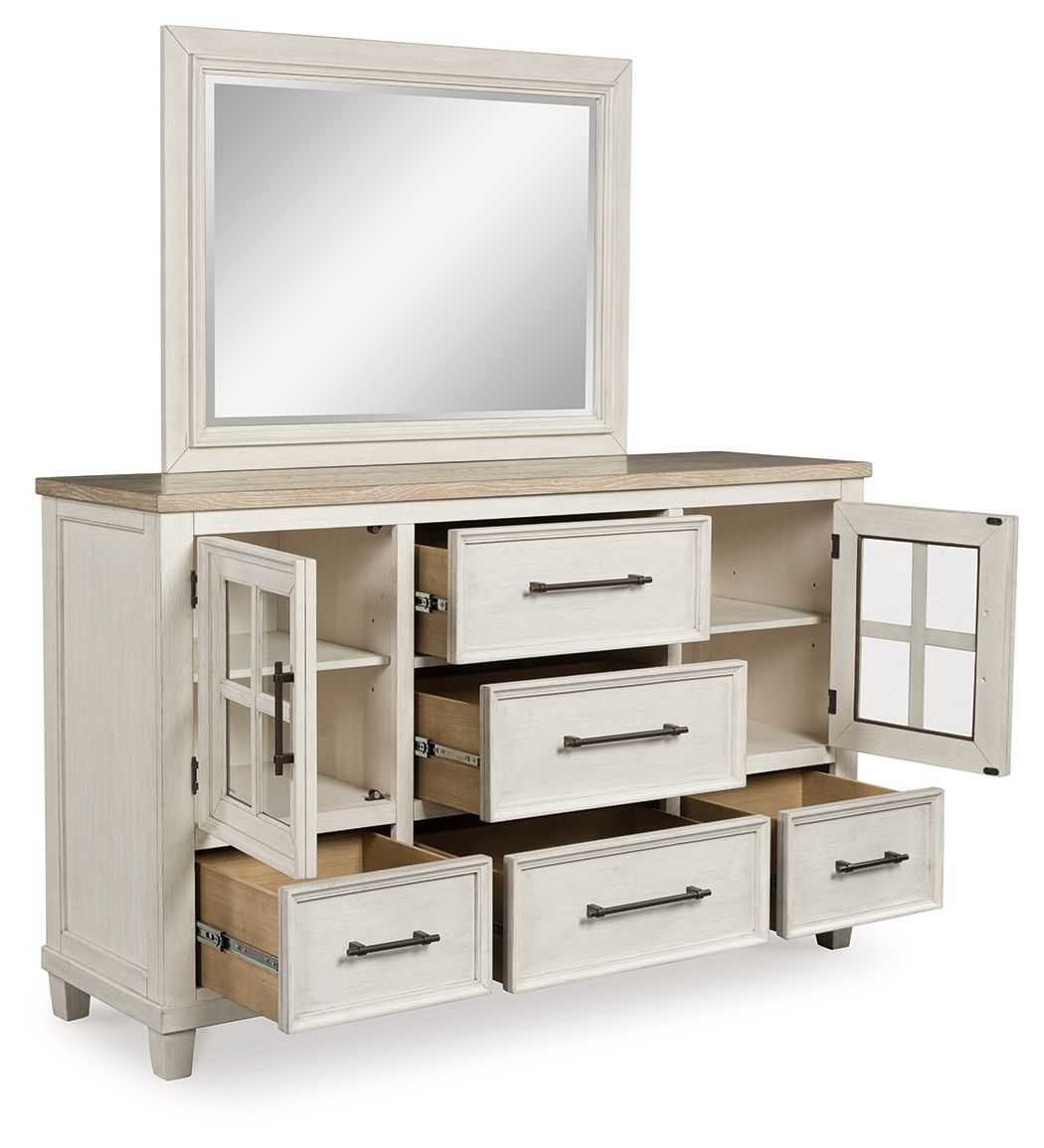 Antique white dresser with framed mirror, open compartments, and drawers