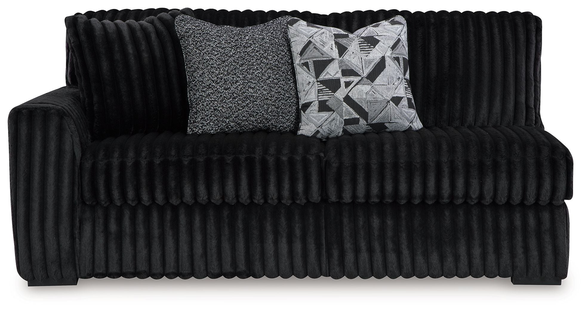 Tufted ribbed onyx black sofa with armrests, two accent pillows, and wide seat