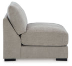 Pebble armless accent chair with rounded back, upholstered seat, black base feet