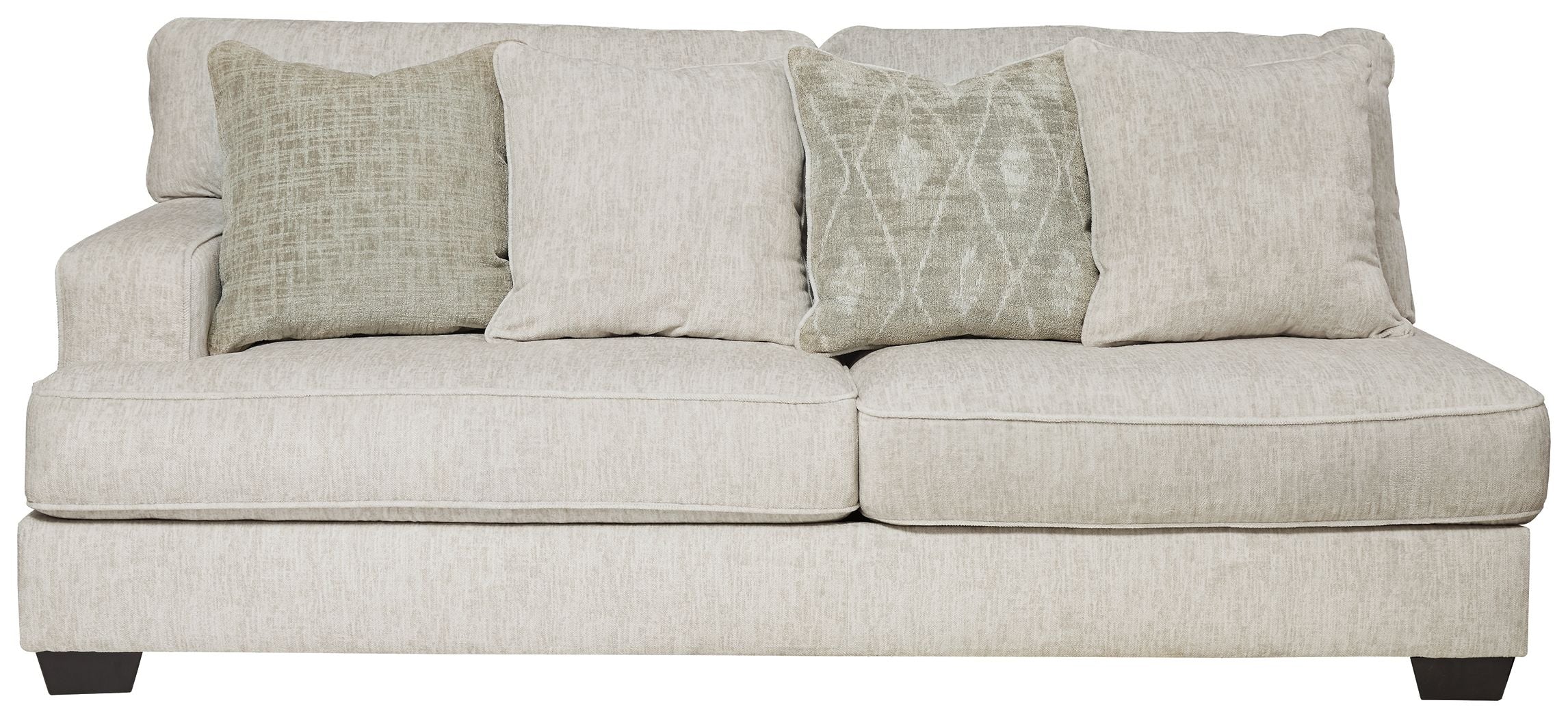 Parchment beige upholstered sofa with two seat cushions and decorative pillows