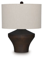 Distressed brown metal table lamp base with beige fabric drum shade