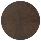Round dark wood table top with visible radial grain pattern.