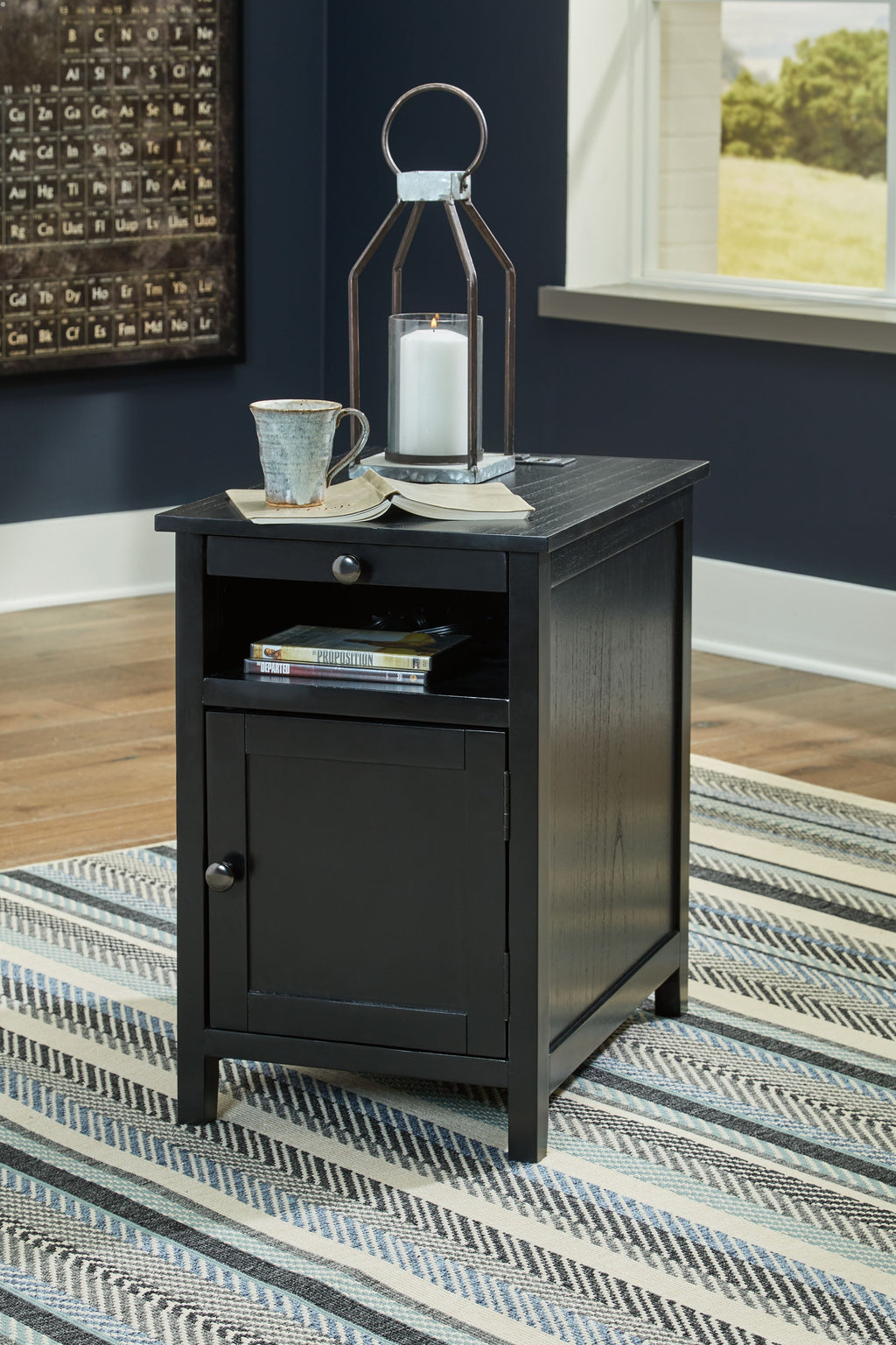 Dark gray chair side end table with cabinet door, drawer pull, and open shelf