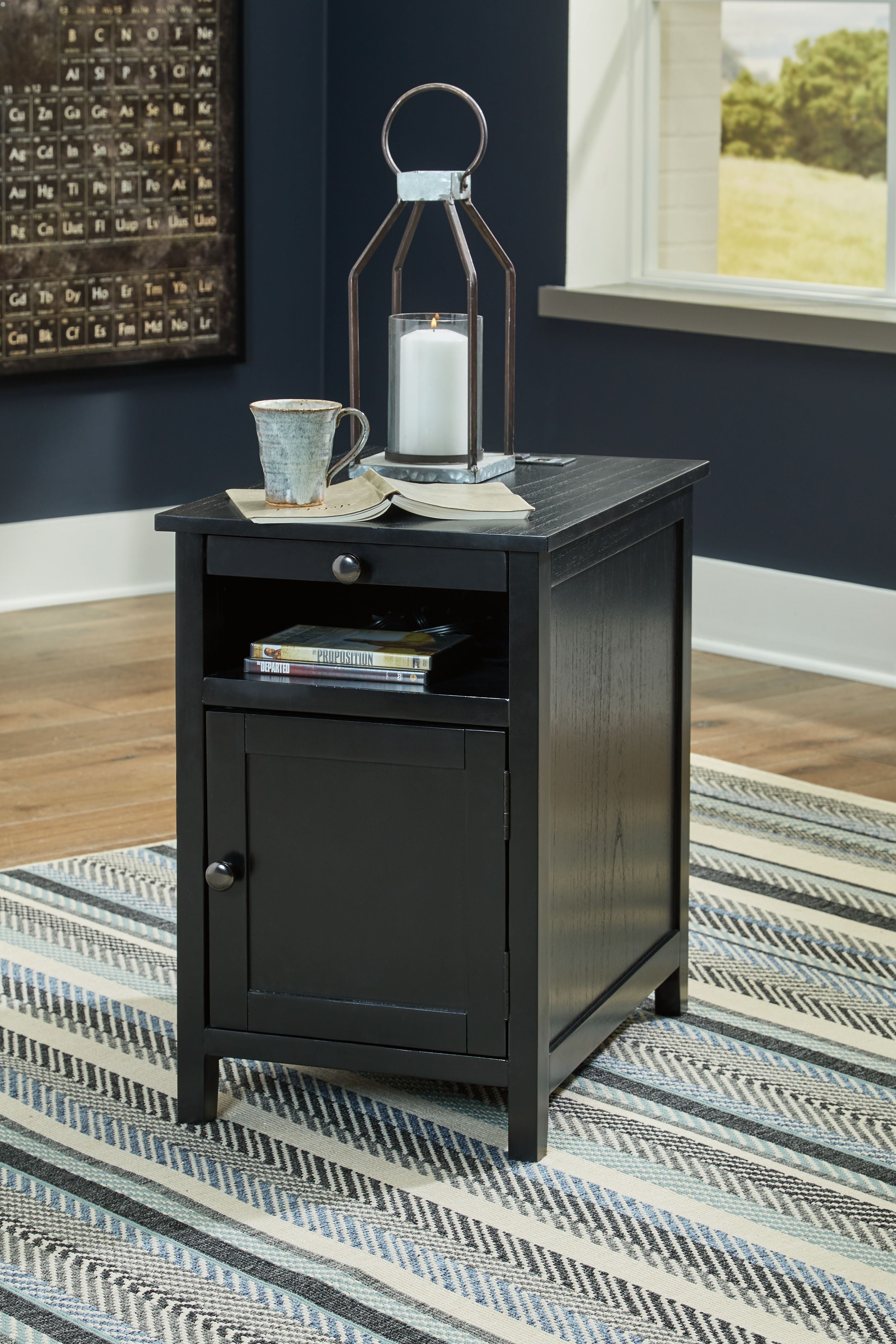 Dark gray chair side end table with cabinet door, drawer pull, and open shelf