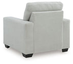 Upholstered armchair with striped texture, rounded back, and block legs in light gray.
