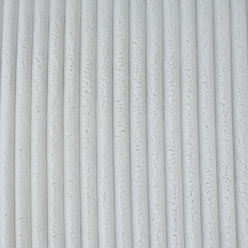 Light gray ribbed cushion fabric close-up, vertical stripe texture