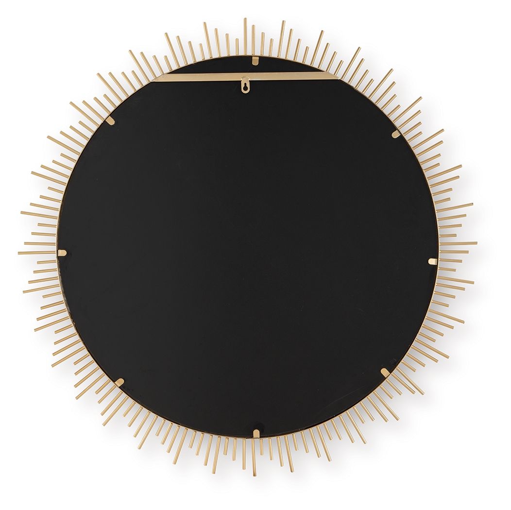 Gold accent mirror backing with circular black plate and radiating rods
