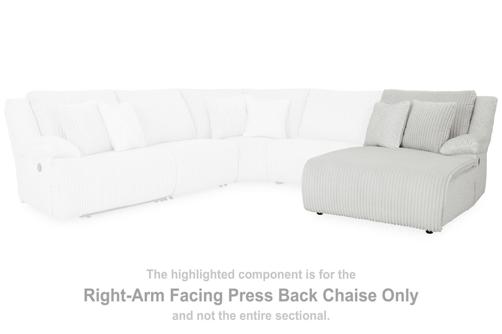 Light gray striped chaise lounge with low seat and cushioned back rest on sofa section