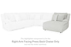 Light gray striped chaise lounge with low seat and cushioned back rest on sofa section