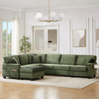 Green corduroy sectional sofa with chaise, multiple back cushions, and ottoman