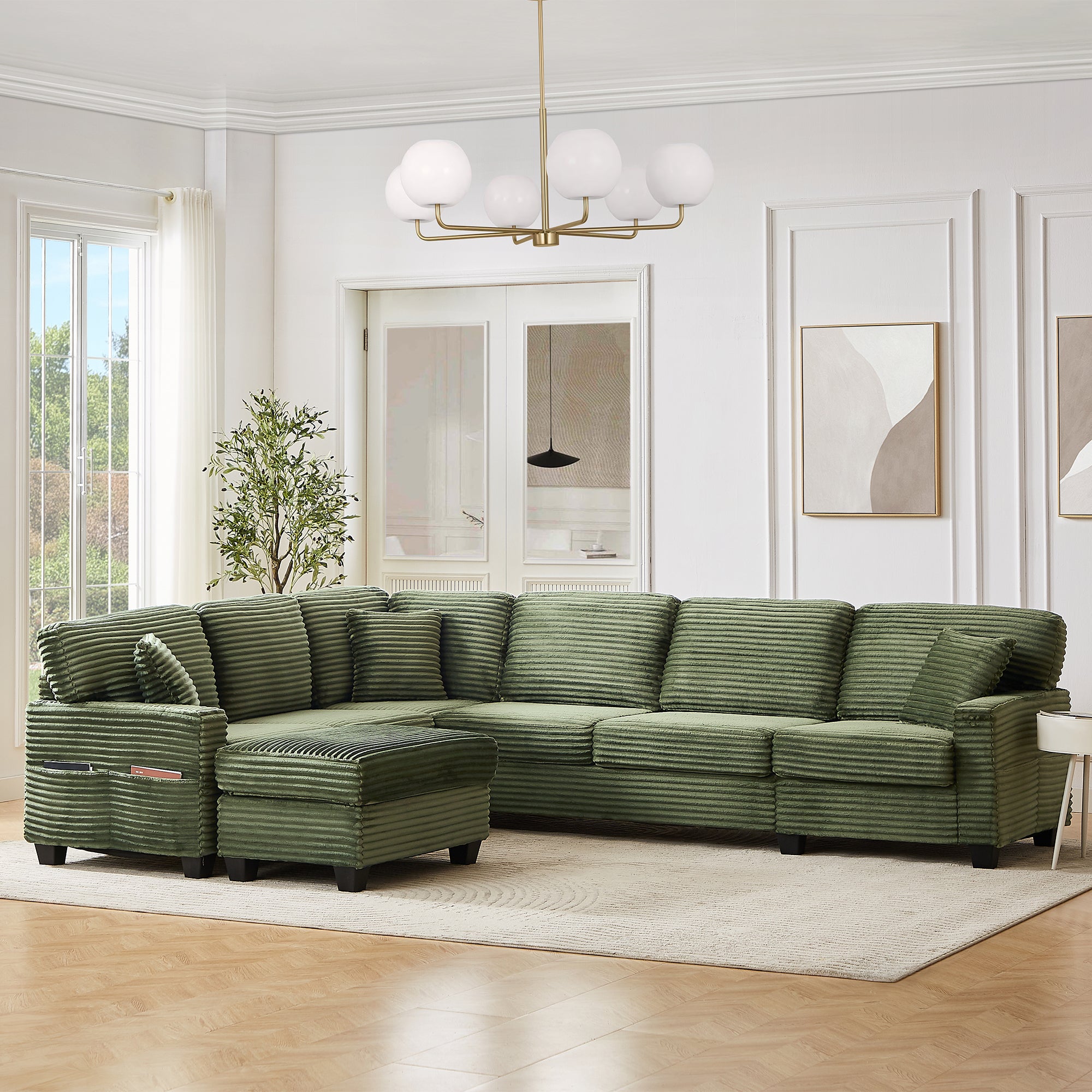 Green corduroy sectional sofa with chaise, multiple back cushions, and ottoman