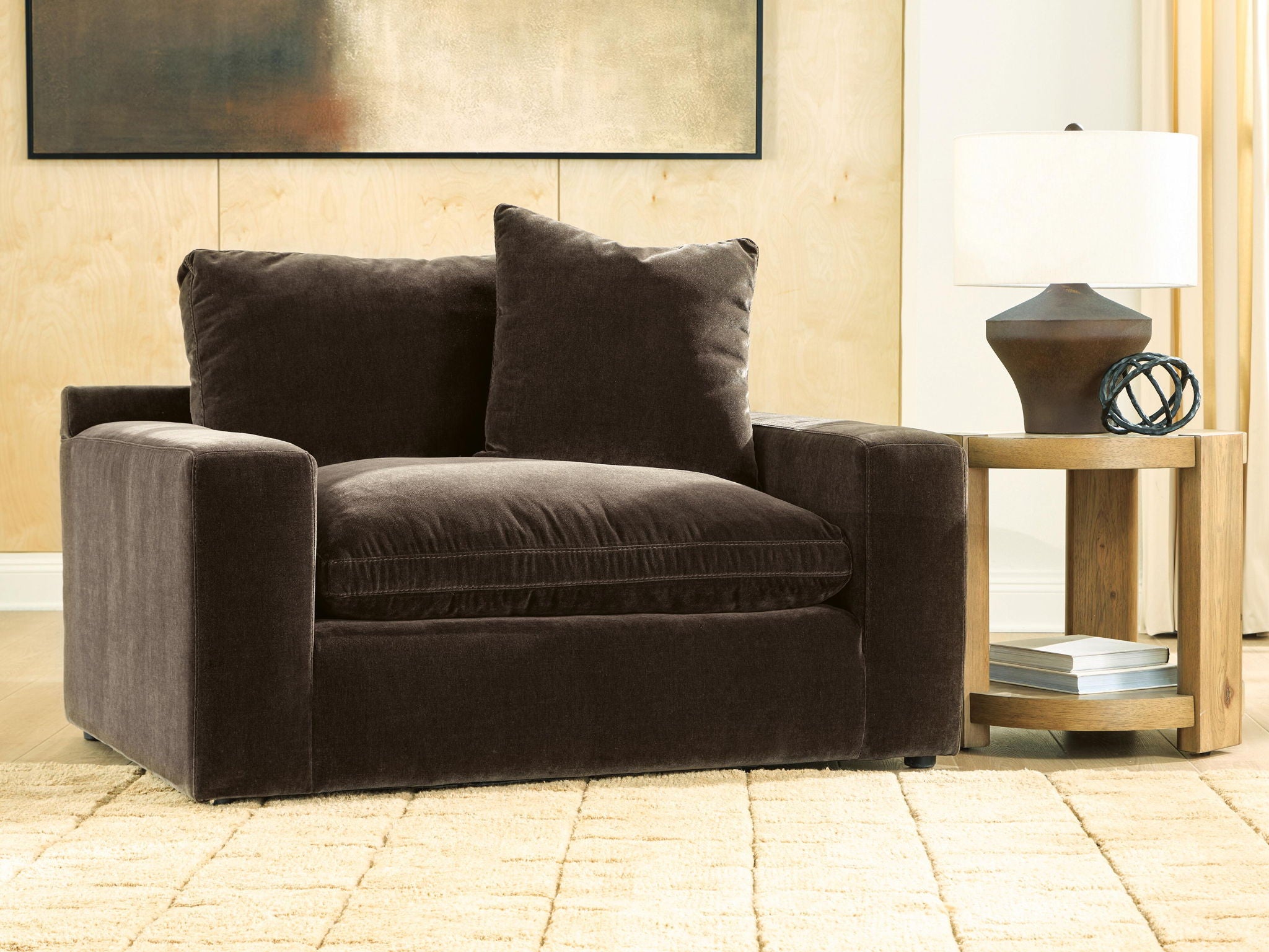 Maxton Heights chair and a half in dark brown with pleated seat cushion and pillows