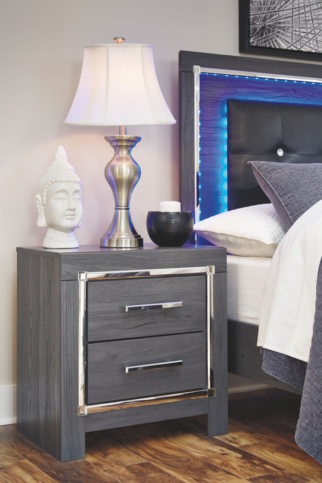 Gray night stand with two drawers, chrome bar handles, and metal frame sides