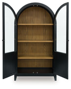 Black accent cabinet with arched interior shelves, double doors open