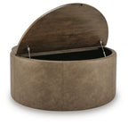 Round warm brown storage ottoman with open lid showing dark interior
