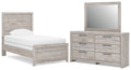 Light gray panel bedroom set with bed, dresser, and wall mirror