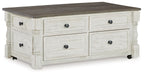 Lift-top cocktail table with four storage drawers, white finish and dark wood top