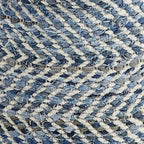 Close-up of blue and cream chevron woven fabric on a pouf