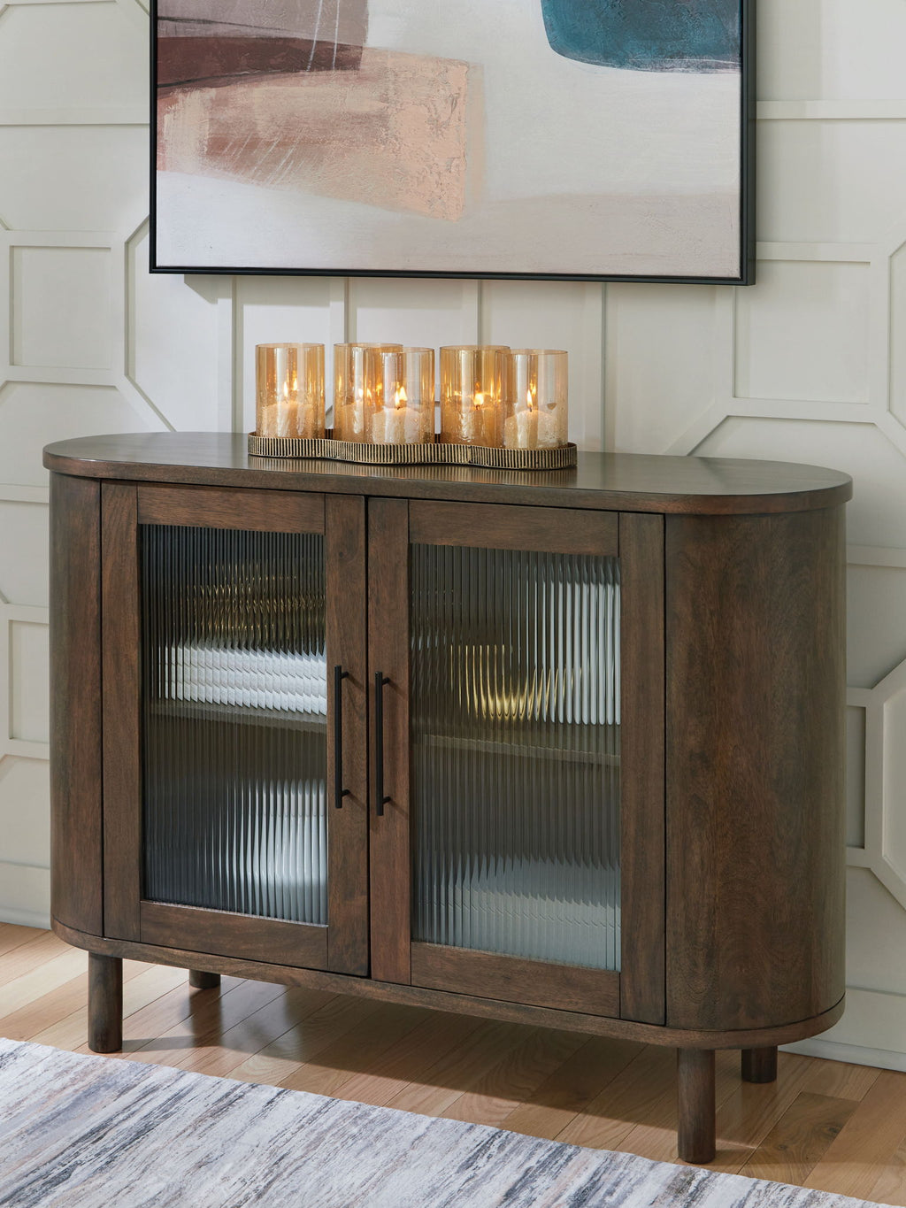 Medium brown accent cabinet with ribbed glass doors and tapered legs