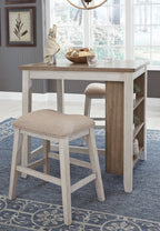 Rectangular counter table with open shelf and beige upholstered stool, side view